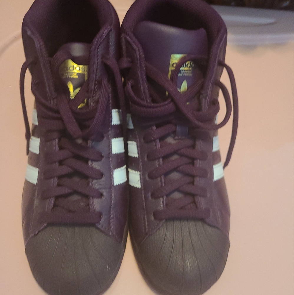 Burgundy adidas.